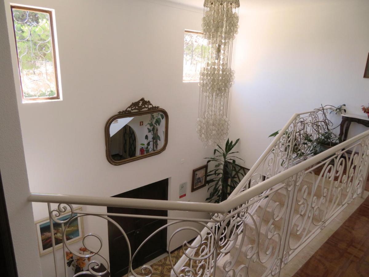 Quarto Individual com Varanda